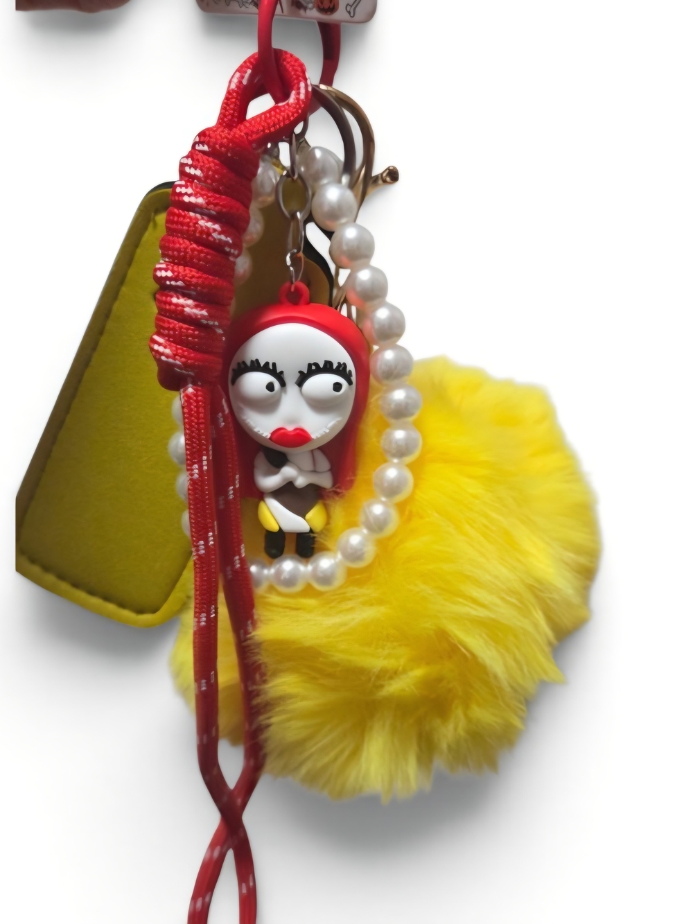 Yellow Faux Fur Pom Pom Keychain with Red Character Charm